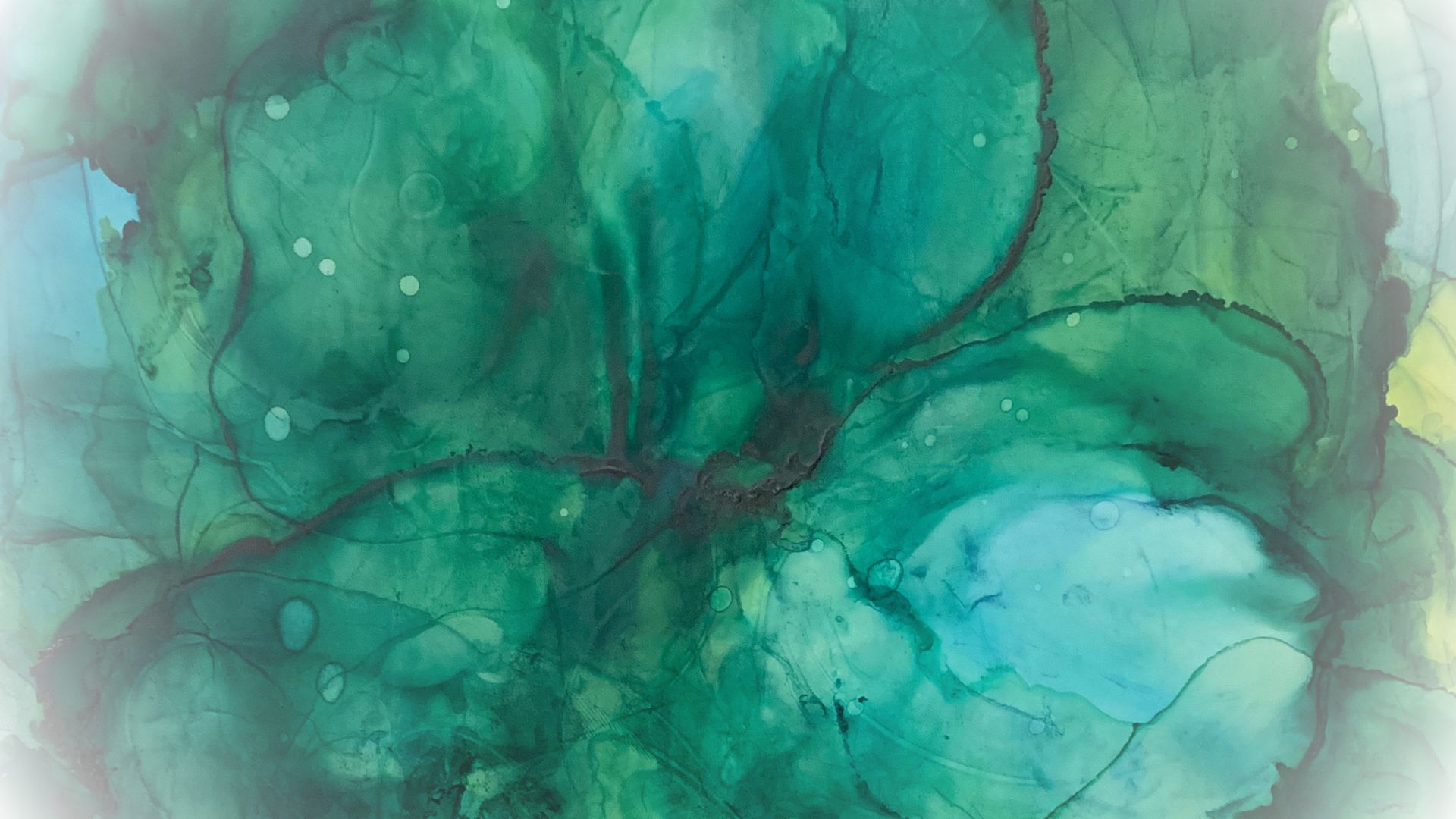 Alcohol ink blooms in emerald, teal and aqua with soft faded edges